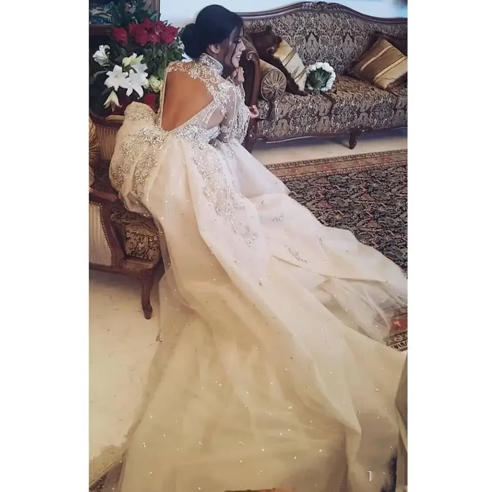 Customized Luxury High Neck Open Back Wedding Dresses Long Sleeves Beads Crystals Mermaid Bridal Dress With Detachable Train
Customized Luxury High Neck Open Back Wedding Dresses Long Sleeves Beads Crystals Mermaid Bridal Dress With Detachable Train