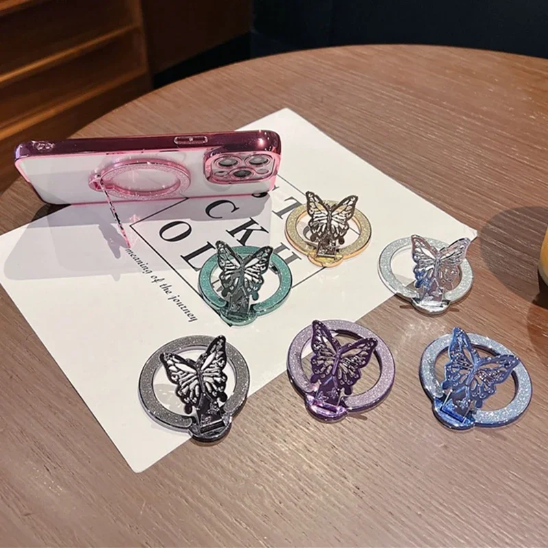 Stylish Glitter Bling Butterfly Phone Holder For Magsafe Wireless Charging Mobile Phone Desk Bracket Finger Ring Stand Universal 
Stylish Glitter Bling Butterfly Phone Holder For Magsafe Wireless Charging Mobile Phone Desk Bracket Finger Ring Stand Universal