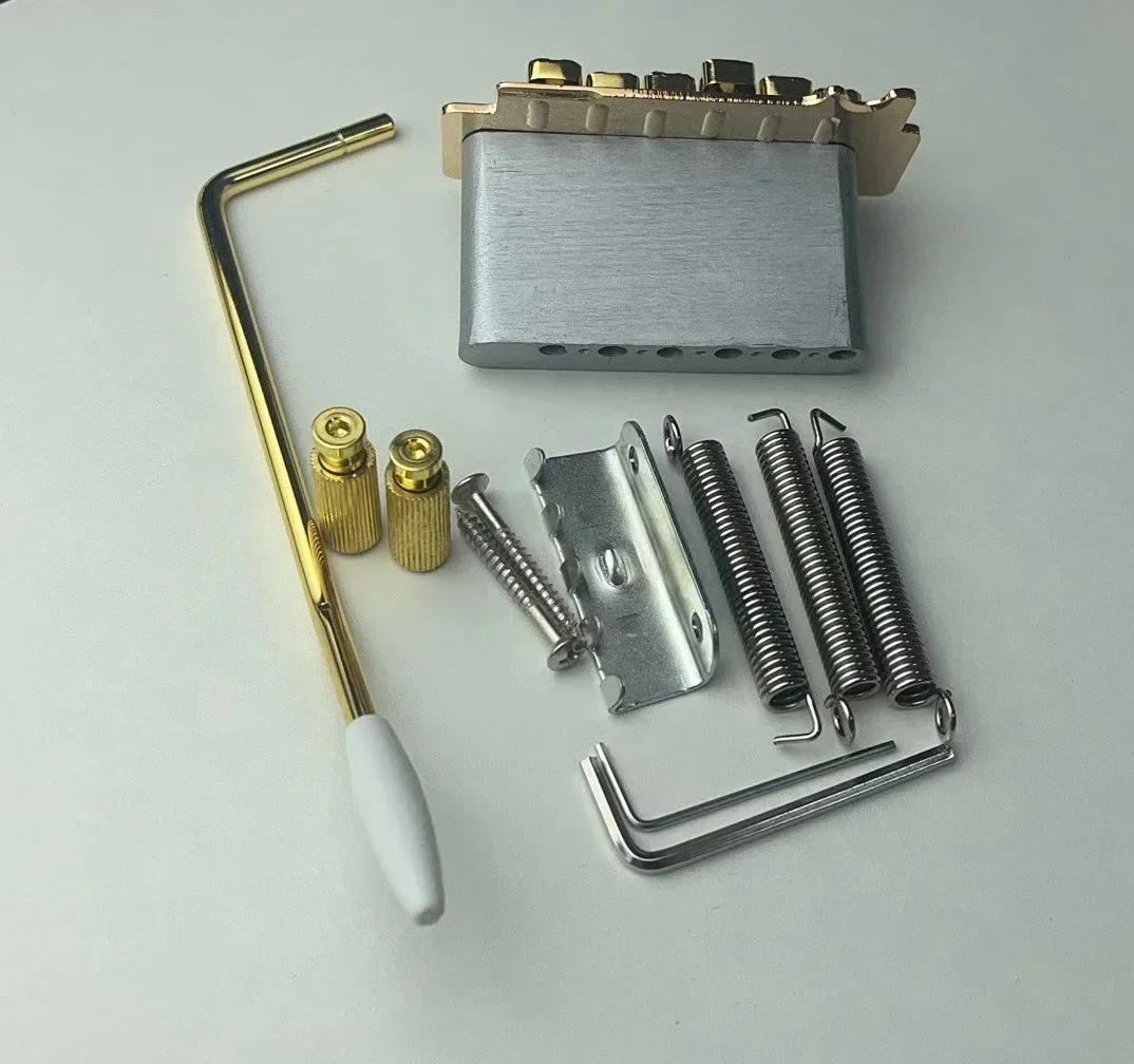 -Discount Hot Sale--Wilkinson Licensed Knife Edge Type 2 Back Point Double Swing Electric Guitar Tremolo Bridge WOV10 Gold
-Discount Hot Sale--Wilkinson Licensed Knife Edge Type 2 Back Point Double Swing Electric Guitar Tremolo Bridge WOV10 Gold