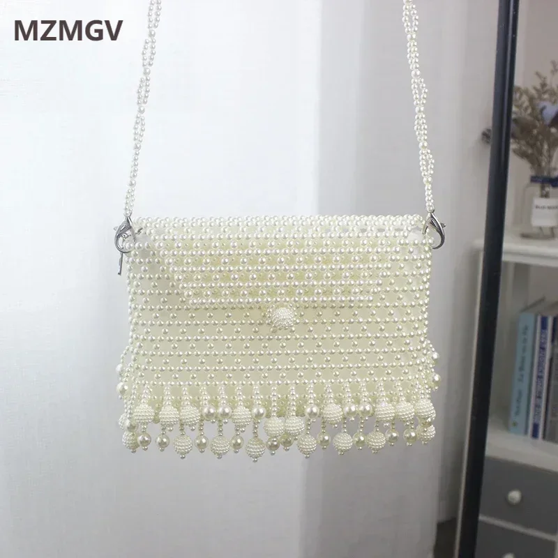 Handmade Pearl Bag Woven Shoulder Bag Key Change Mobile Phone Bag Cross Section Messenger Bag Party Wedding Trumpet Tassel Bag
Handmade Pearl Bag Woven Shoulder Bag Key Change Mobile Phone Bag Cross Section Messenger Bag Party Wedding Trumpet Tassel Bag