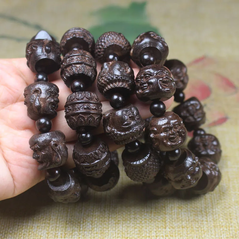 Wholesale Vietnamese Agarwood Buddha Head Guanyin Eighteen Arhats Buddhist Bead Bracelet20mm Men and Women Long Term Supply
Wholesale Vietnamese Agarwood Buddha Head Guanyin Eighteen Arhats Buddhist Bead Bracelet20mm Men and Women Long Term Supply