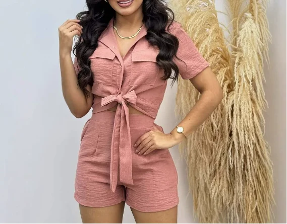 New spring and summer fashion short sleeved lace up shirt casual shorts two-piece set 
New spring and summer fashion short sleeved lace up shirt casual shorts two-piece set