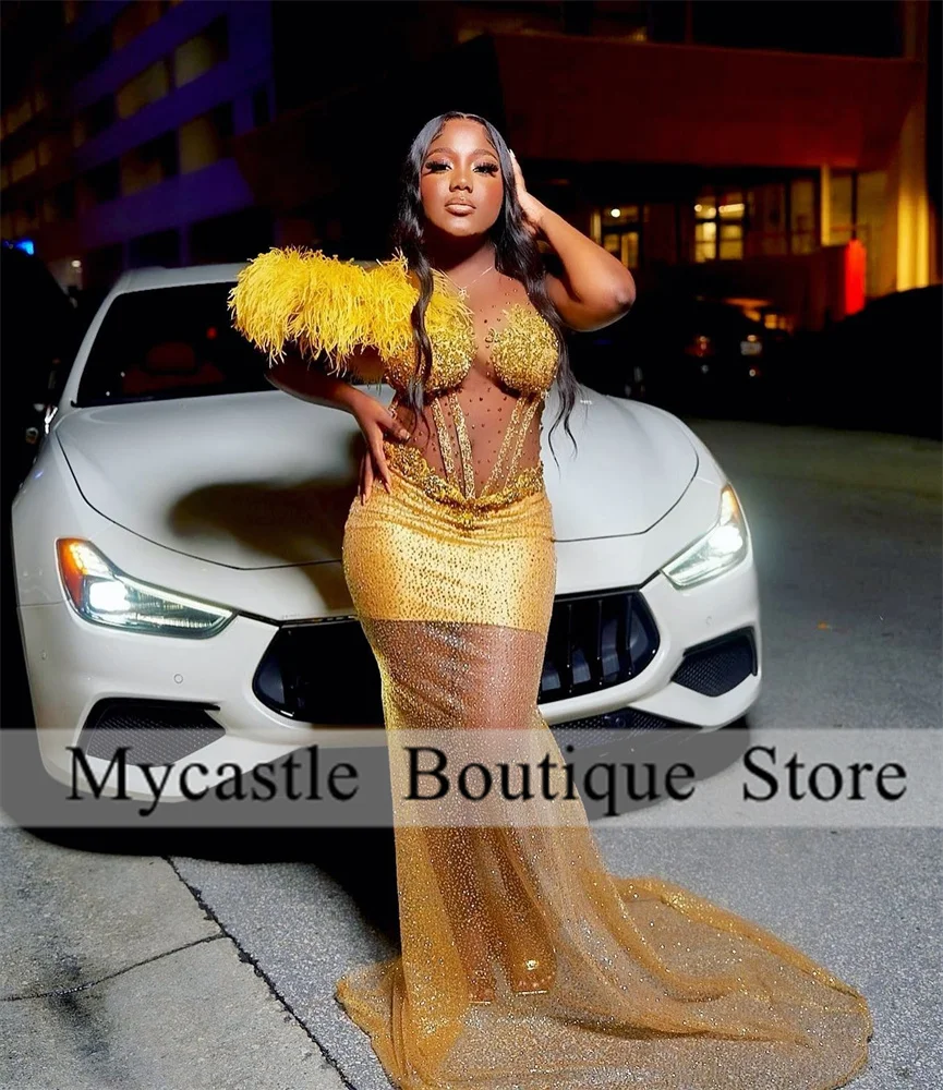 Aso Ebi Gold Lace Beaded Mermaid Evening Dresses For Women 2025 Customized Crystals Feathers Sheer Neck Wedding Party Gowns
Aso Ebi Gold Lace Beaded Mermaid Evening Dresses For Women 2025 Customized Crystals Feathers Sheer Neck Wedding Party Gowns