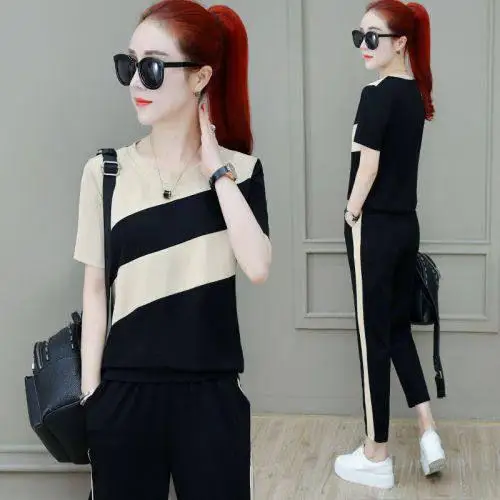 Summer plus Size Women's Sportswear Short Sleeve Casual Loose Slimming Nine-Piece Pants Set round Neck Two-Piece Suit
Summer plus Size Women's Sportswear Short Sleeve Casual Loose Slimming Nine-Piece Pants Set round Neck Two-Piece Suit