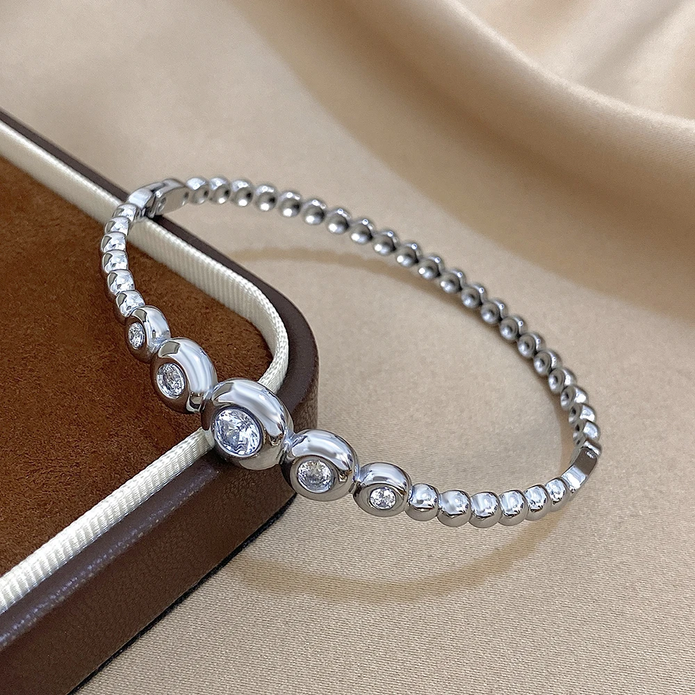 Elegant Zircon Stainless Steel Charm Bangle Bracelet for Women Minimalist Round Spring Opening Bangle Luxury Jewelry Accessories
Elegant Zircon Stainless Steel Charm Bangle Bracelet for Women Minimalist Round Spring Opening Bangle Luxury Jewelry Accessories