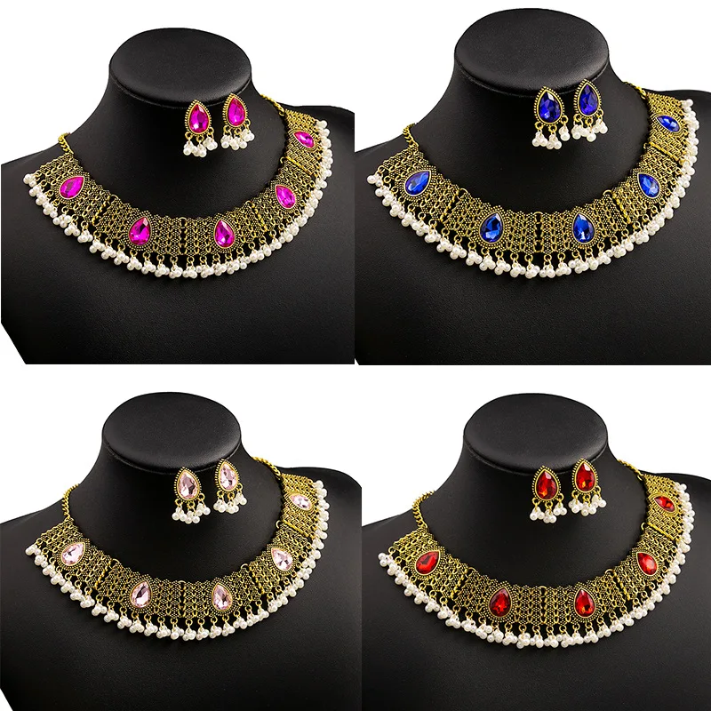 Vintage hollow gemstone necklace set, bohemian metal style pearl fringed earrings exaggerated personality accessories
Vintage hollow gemstone necklace set, bohemian metal style pearl fringed earrings exaggerated personality accessories
