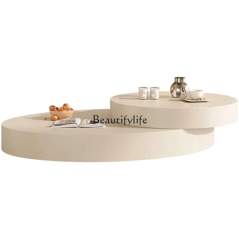 French cream wind rotating coffee table modern simple retro wabi-sabi wind oval living room coffee table
French cream wind rotating coffee table modern simple retro wabi-sabi wind oval living room coffee table