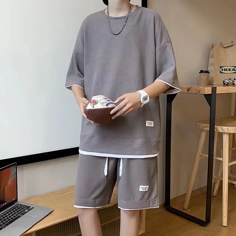 Новые летние мужские вафельные комплекты, повседневная футболка и шорты, мужской спортивный костюм, однотонный спортивный костюм, свободные костюмы, размер 5XL
Новые летние мужские вафельные комплекты, повседневная футболка и шорты, мужской спортивный костюм, однотонный спортивный костюм, свободные костюмы, размер 5XL