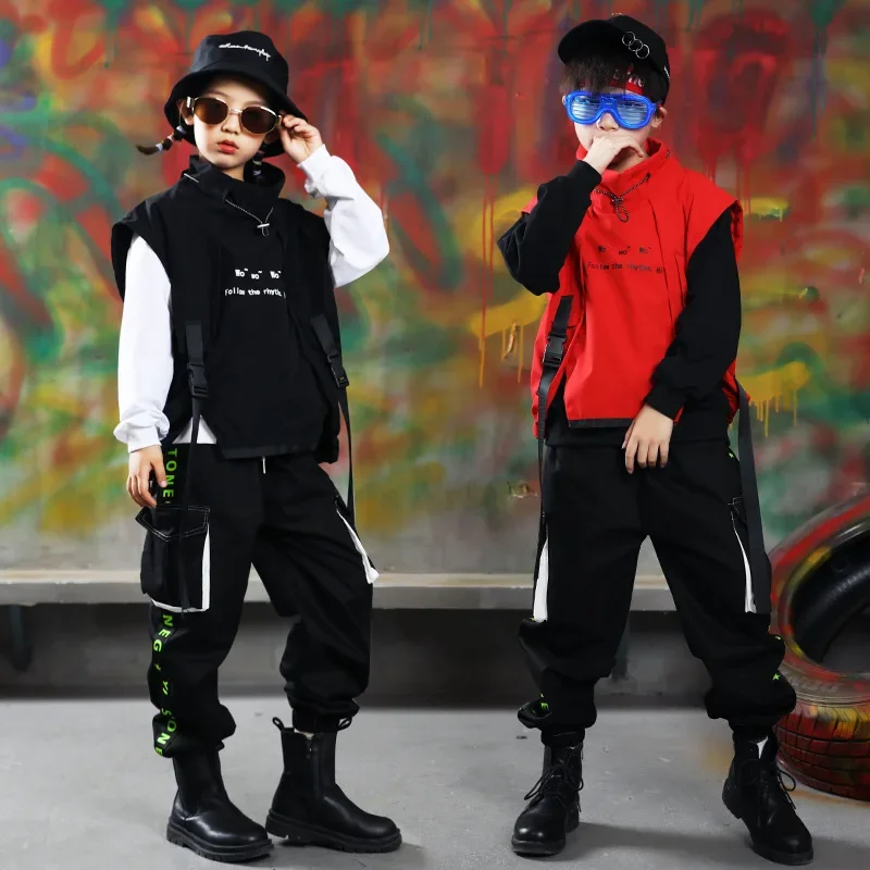 Комплект для уличных танцев для мальчиков, модная модель для джазовых танцев, детский жилет в стиле хип-хоп и рабочие брюки, костюм для подиума на сцене для мальчиков
Комплект для уличных танцев для мальчиков, модная модель для джазовых танцев, детский жилет в стиле хип-хоп и рабочие брюки, костюм для подиума на сцене для мальчиков