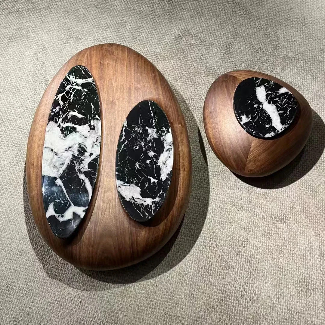 a pebble coffee table combination modern medieval style new Chinese style oval creative coffee table special shape
a pebble coffee table combination modern medieval style new Chinese style oval creative coffee table special shape