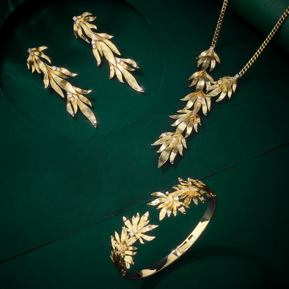 IN JEWELIFE позолоченные комплекты ювелирных изделий в форме листа для женщин, ожерелья, серьги, браслет с кубическим цирконием, свадебные ювелирные аксессуары
IN JEWELIFE позолоченные комплекты ювелирных изделий в форме листа для женщин, ожерелья, серьги, браслет с кубическим цирконием, свадебные ювелирные аксессуары