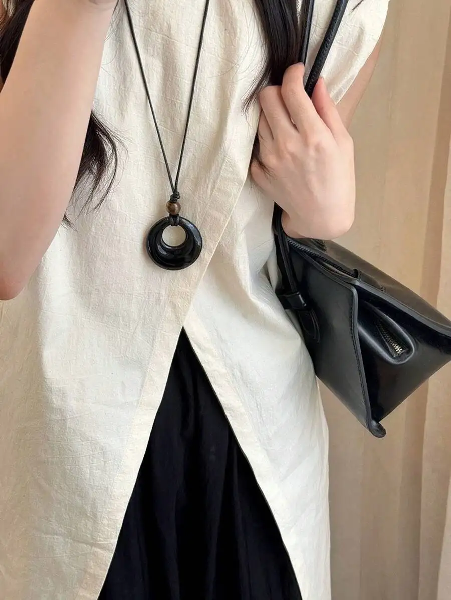 Water Drop Acrylic Pendant on Leather Cord Necklace
Water Drop Acrylic Pendant on Leather Cord Necklace
