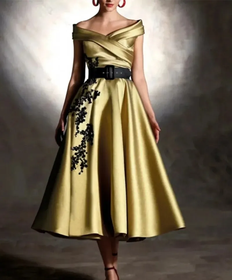 2025 New Gold Mother of The Bride Dress Off Shoulder Lace Appliques Satin A-line Tea Length Wedding Guest Party Gowns
2025 New Gold Mother of The Bride Dress Off Shoulder Lace Appliques Satin A-line Tea Length Wedding Guest Party Gowns
