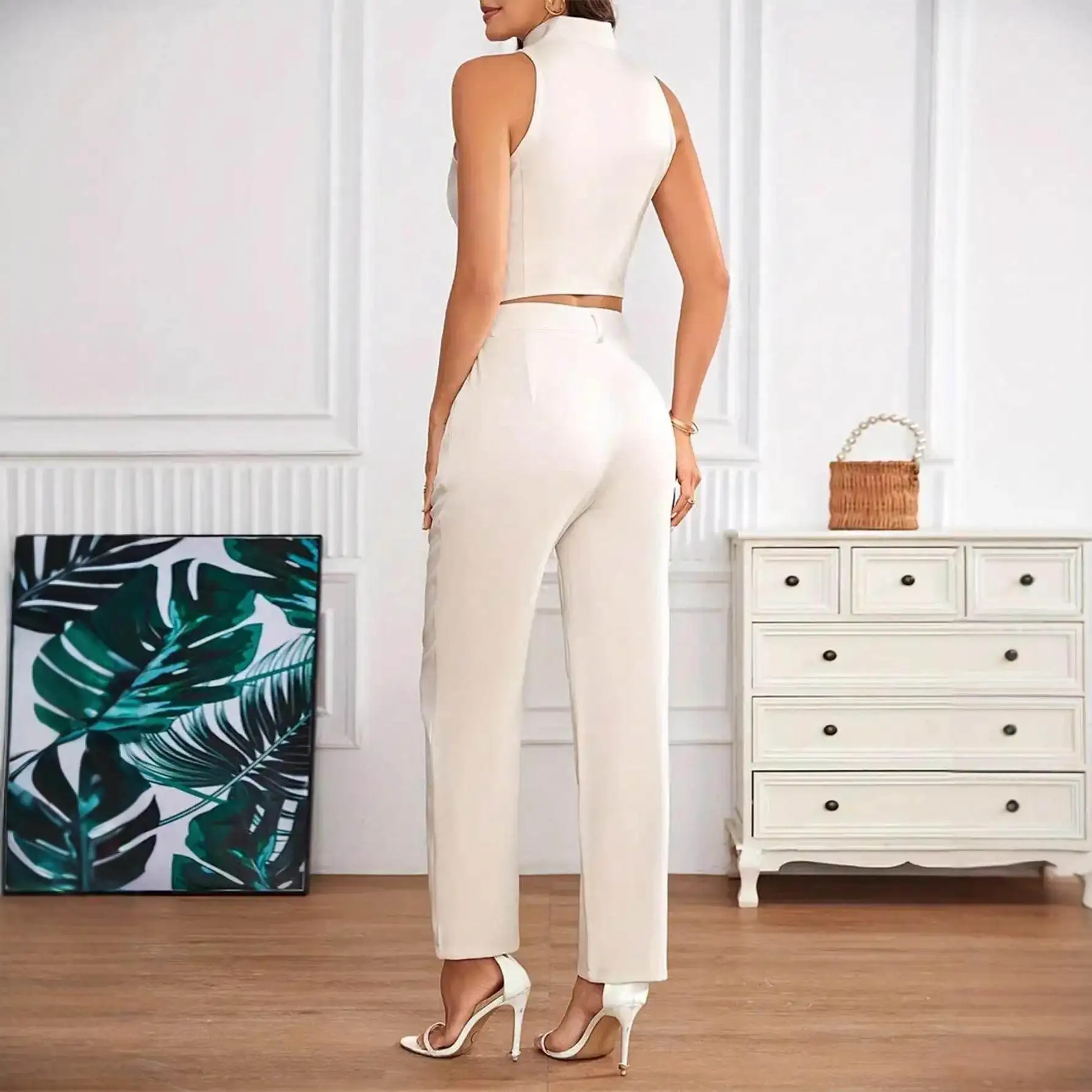 Ladies Casual British Style Sleeveless Two-Piece Suit Set for Office Commuting Pants And Vest Outfit Ideal for All Seasons
Ladies Casual British Style Sleeveless Two-Piece Suit Set for Office Commuting Pants And Vest Outfit Ideal for All Seasons