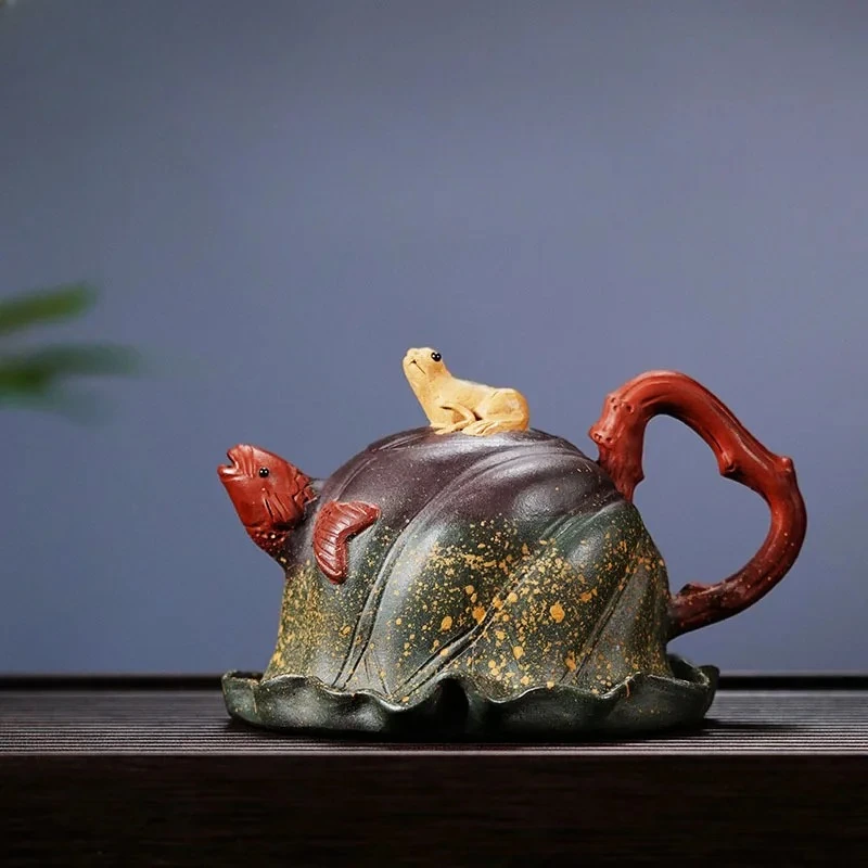 280ml Authentic Yixing Purple Clay Teapots Handmade Lotus Leaf Frog Pot Raw Ore Section Mud Tea Soaking Kettle Zisha Tea Set
280ml Authentic Yixing Purple Clay Teapots Handmade Lotus Leaf Frog Pot Raw Ore Section Mud Tea Soaking Kettle Zisha Tea Set