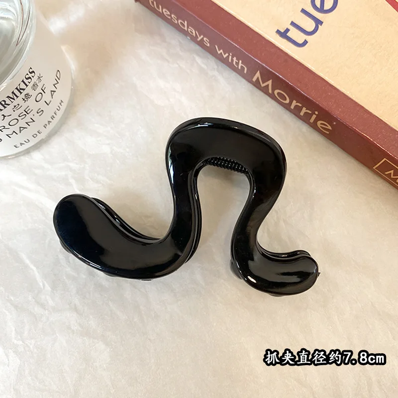 Grab clip Women's high ponytail hairpin Premium sense disc hair Back head Shark clip hair accessories
Grab clip Women's high ponytail hairpin Premium sense disc hair Back head Shark clip hair accessories
