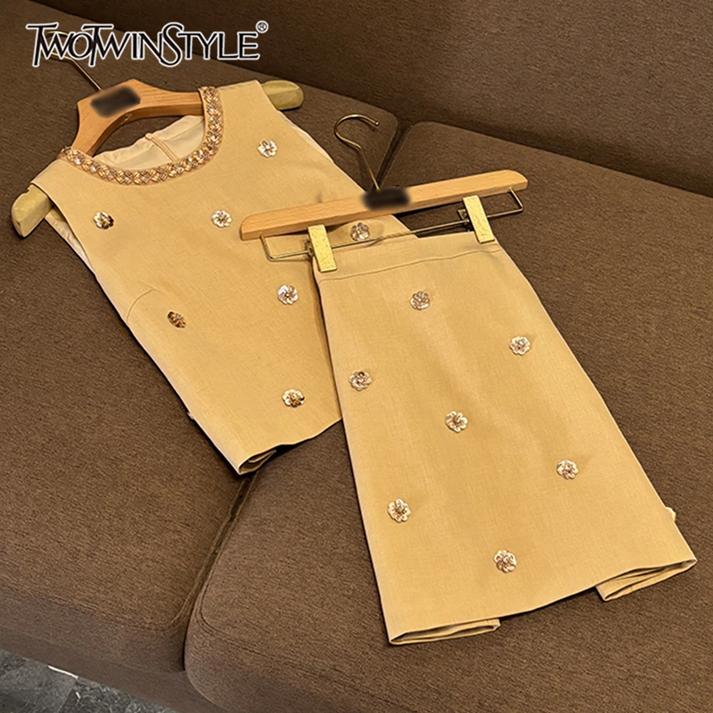 TWOTWINSTYLE Solid Loose Two Piece Sets For Women Round Neck Sleeveless Top High Waist Skirt Elegant Set Female New KSE536515
TWOTWINSTYLE Solid Loose Two Piece Sets For Women Round Neck Sleeveless Top High Waist Skirt Elegant Set Female New KSE536515