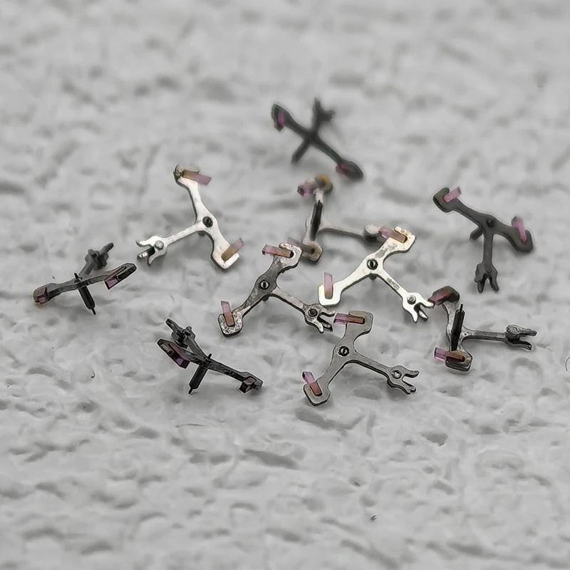 1/2/5PCS 46941 Movement Anchor Wheel for Oriental Double Lion Watches Maintenance Modification of 46943 46941 Movements
1/2/5PCS 46941 Movement Anchor Wheel for Oriental Double Lion Watches Maintenance Modification of 46943 46941 Movements