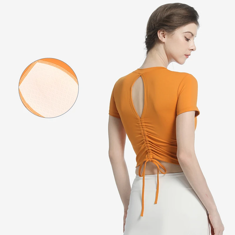 New Hollow Back Yoga Clothes Short Sleeves Women's Fashionable Drawstring Pleated Chest Pad Integrated Fitness Sports T-shirt 
New Hollow Back Yoga Clothes Short Sleeves Women's Fashionable Drawstring Pleated Chest Pad Integrated Fitness Sports T-shirt