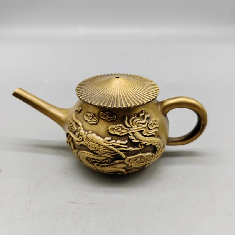 Chinese collection antique copper long spout dragon and phoenix relief teapot ornaments home decoration teapot modern crafts
Chinese collection antique copper long spout dragon and phoenix relief teapot ornaments home decoration teapot modern crafts