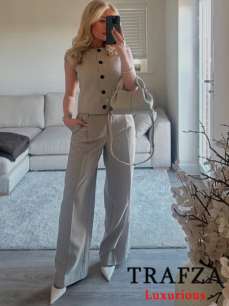 TRAFZA Vintage Chic Women Striped Suit Single Breasted Sleeveless Top Straight Long Loose Pants Fashion 2025 Spring Summer Sets
TRAFZA Vintage Chic Women Striped Suit Single Breasted Sleeveless Top Straight Long Loose Pants Fashion 2025 Spring Summer Sets