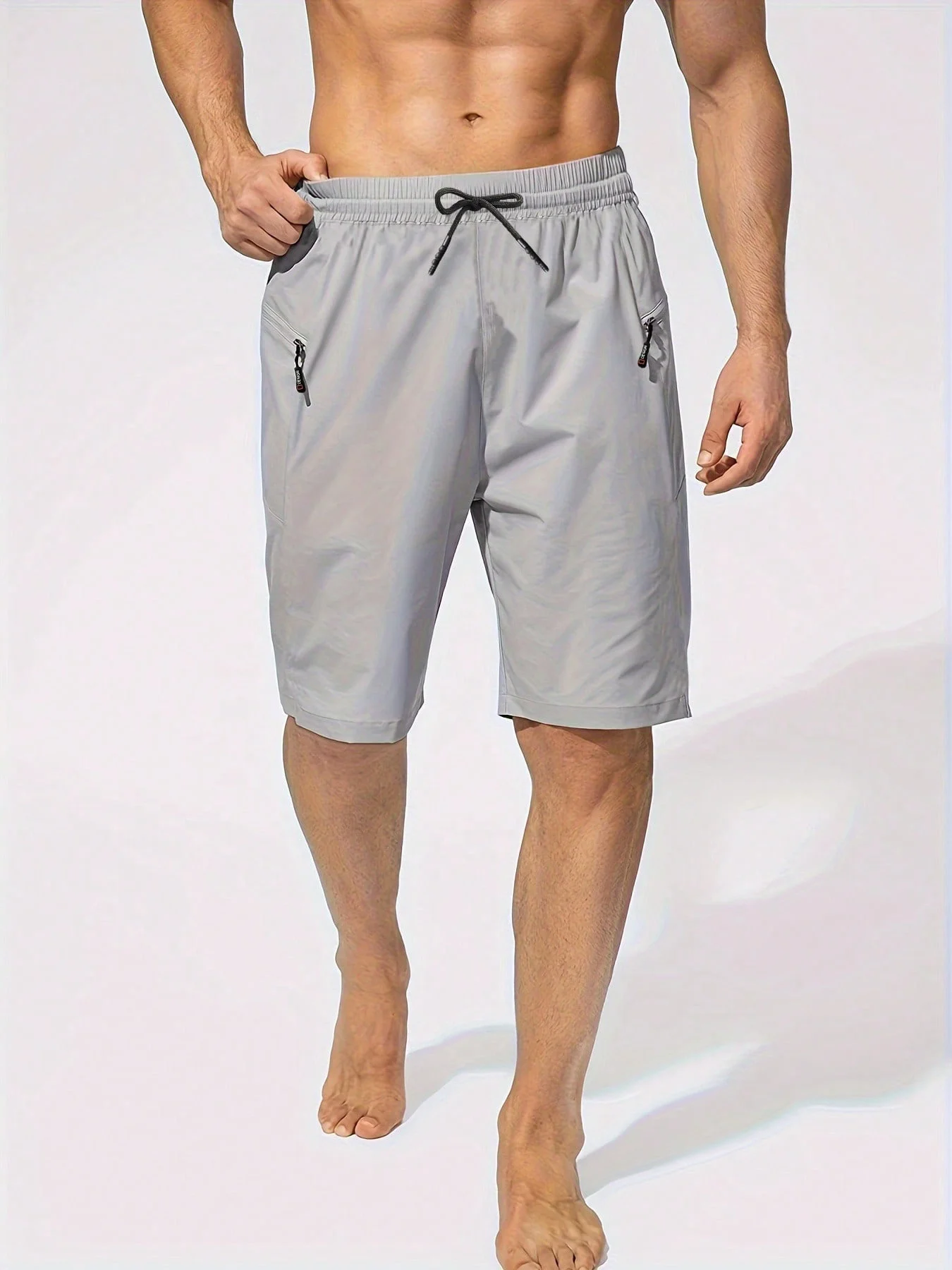 Summer beach men’s zippered pocket sport shorts/five-pocket pants for outdoor activities.
Summer beach men’s zippered pocket sport shorts/five-pocket pants for outdoor activities.