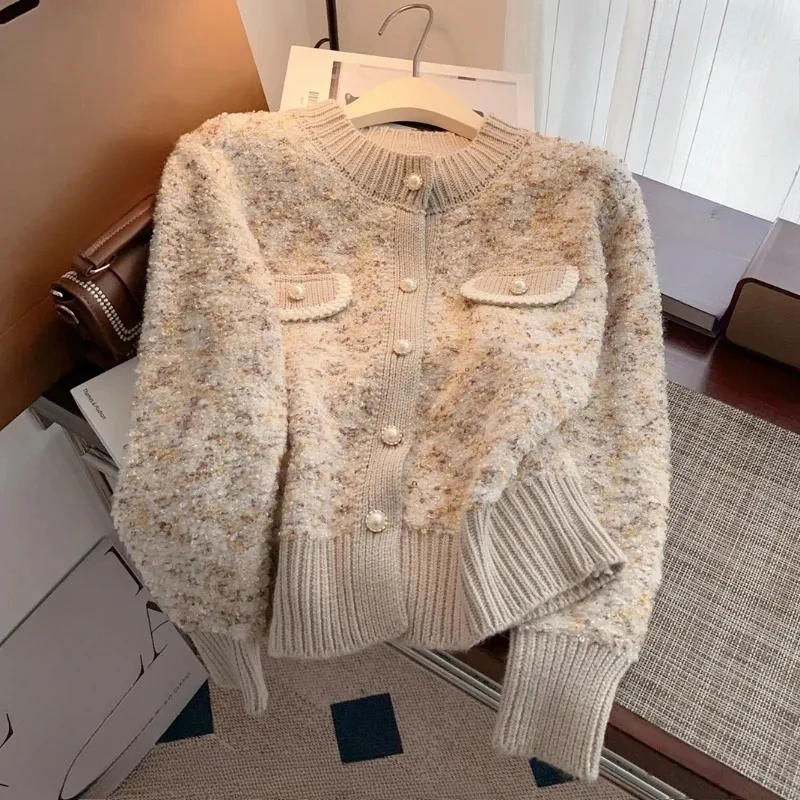 Autumn And Winter 2025 Elegant Korean Version Women Knitted Cardigan Sweater Coat Temperament Versatile Female Sweater Jacket
Autumn And Winter 2025 Elegant Korean Version Women Knitted Cardigan Sweater Coat Temperament Versatile Female Sweater Jacket