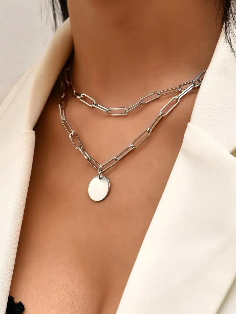 Silver-Tone Layered Paperclip Chain Necklace with Oval Charm
Silver-Tone Layered Paperclip Chain Necklace with Oval Charm