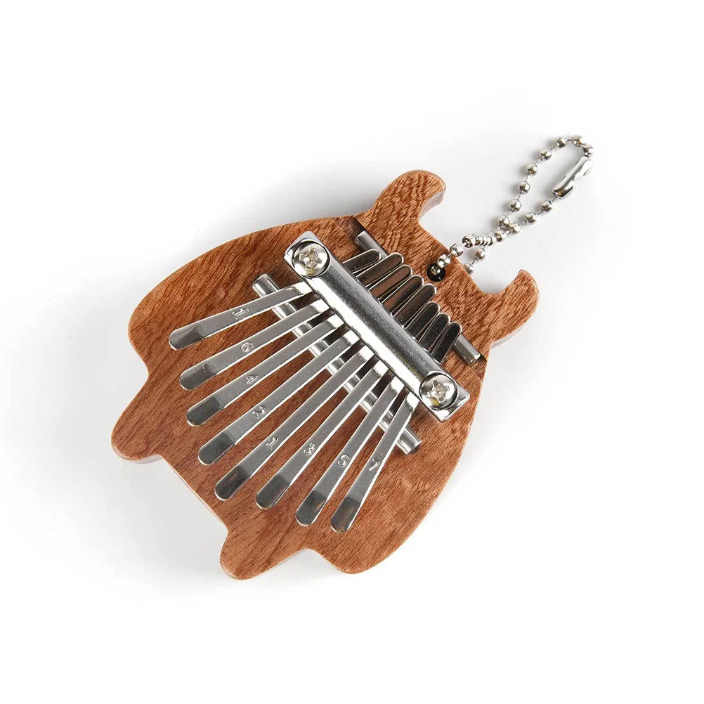8-Tone Mini Kalimba Thumb Piano Wooden Portable Musical Instrument Small Finger Piano Beginner Delight Mini Patterned Kalimba
8-Tone Mini Kalimba Thumb Piano Wooden Portable Musical Instrument Small Finger Piano Beginner Delight Mini Patterned Kalimba