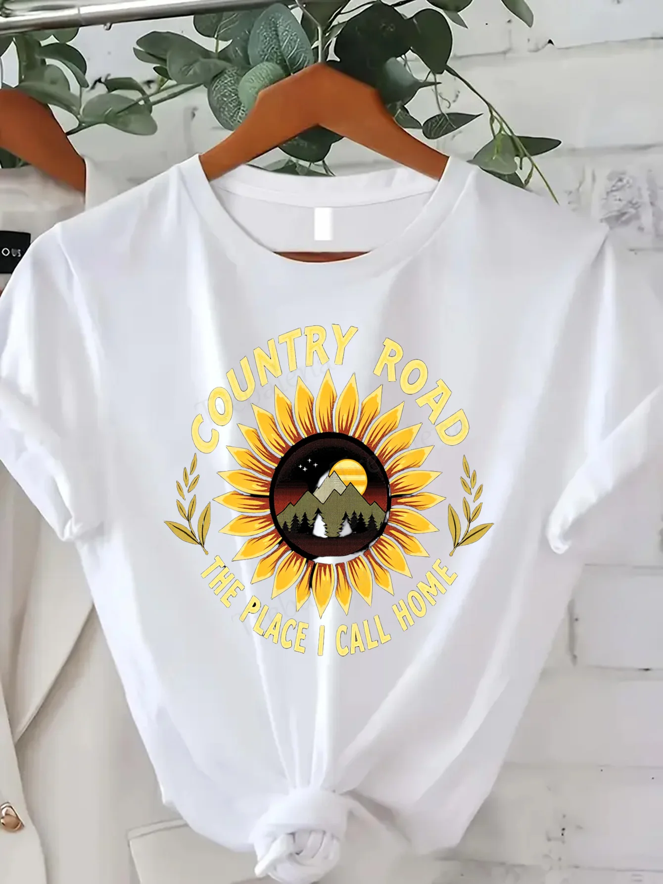 Comfortable Women's Print T-shirt "Country Road Sunflower T-Shirt - The Place I Call Home"
Comfortable Women's Print T-shirt "Country Road Sunflower T-Shirt - The Place I Call Home"