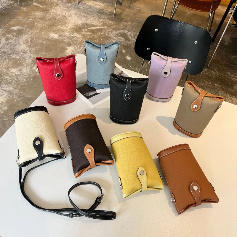Head layer cowhide single shoulder crossbody bucket bag, 2025 versatile commuting niche mobile phone bag for women
Head layer cowhide single shoulder crossbody bucket bag, 2025 versatile commuting niche mobile phone bag for women