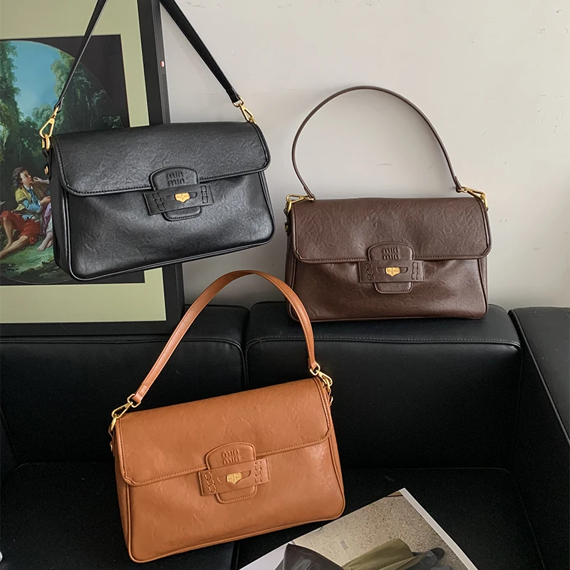 European American Retro Shoulder Bag Solid Color Versatile Saddle Bag Niche Design Messenger Bag Large Capacity Simple Women Bag
European American Retro Shoulder Bag Solid Color Versatile Saddle Bag Niche Design Messenger Bag Large Capacity Simple Women Bag