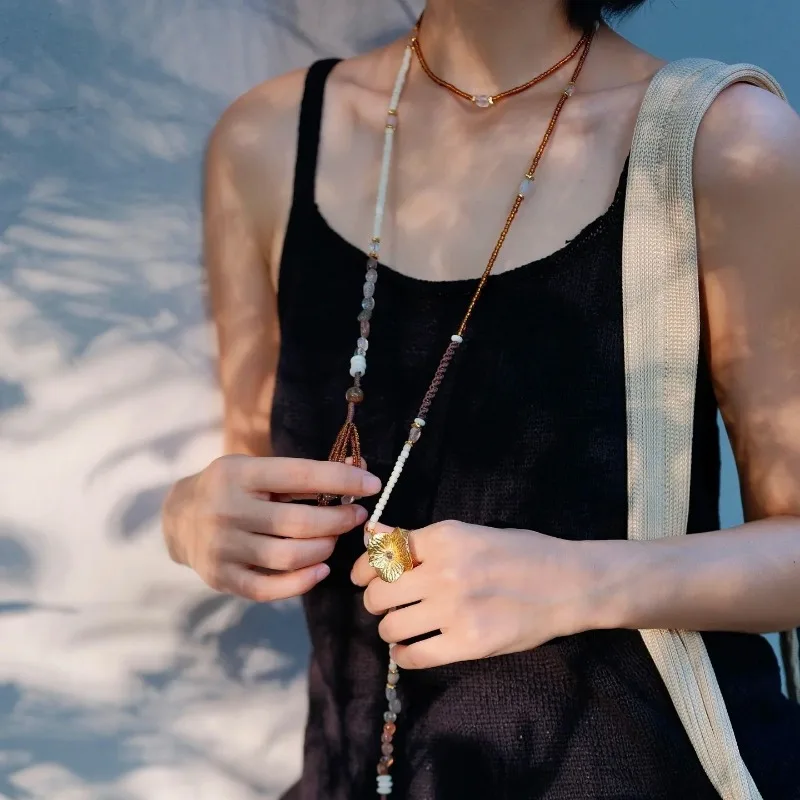 Autumn and Winter Bohemian Beaded Fringed Necklace High-end Niche Sweater Chain Necklace
Autumn and Winter Bohemian Beaded Fringed Necklace High-end Niche Sweater Chain Necklace