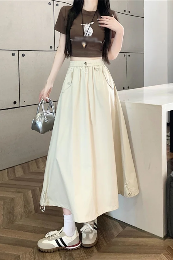 Юбка трапециевидной формы в американском стиле больших размеров для женщин, летняя длинная струящаяся юбка с завязками и высокой талией, популярная девушка, эстетичный драпированный дизайн
Юбка трапециевидной формы в американском стиле больших размеров для женщин, летняя длинная струящаяся юбка с завязками и высокой талией, популярная девушка, эстетичный драпированный дизайн