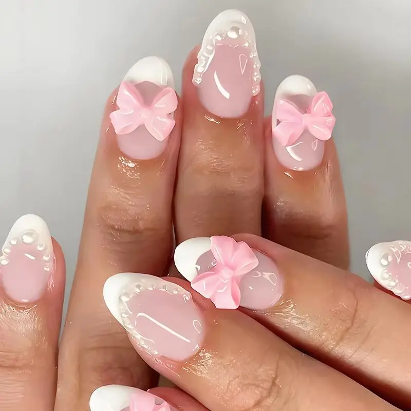 24PCS Simple White French with Pearl False Nails 3D Pink Bowknot Glossy Almond Press on Nail Full Cover Wearable Sweet Fake Nail
24PCS Simple White French with Pearl False Nails 3D Pink Bowknot Glossy Almond Press on Nail Full Cover Wearable Sweet Fake Nail