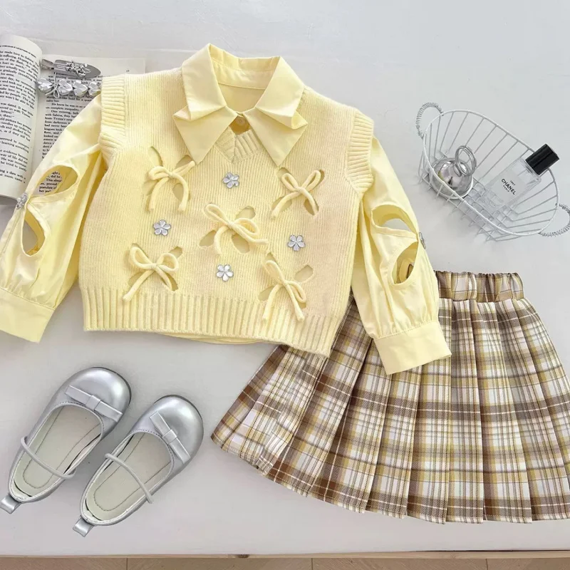 Girls' Knitted Vest Shirt Plaid Skirt Three-Piece Set2025Autumn New Princess Style Long Sleeve Suit Skirt
Girls' Knitted Vest Shirt Plaid Skirt Three-Piece Set2025Autumn New Princess Style Long Sleeve Suit Skirt