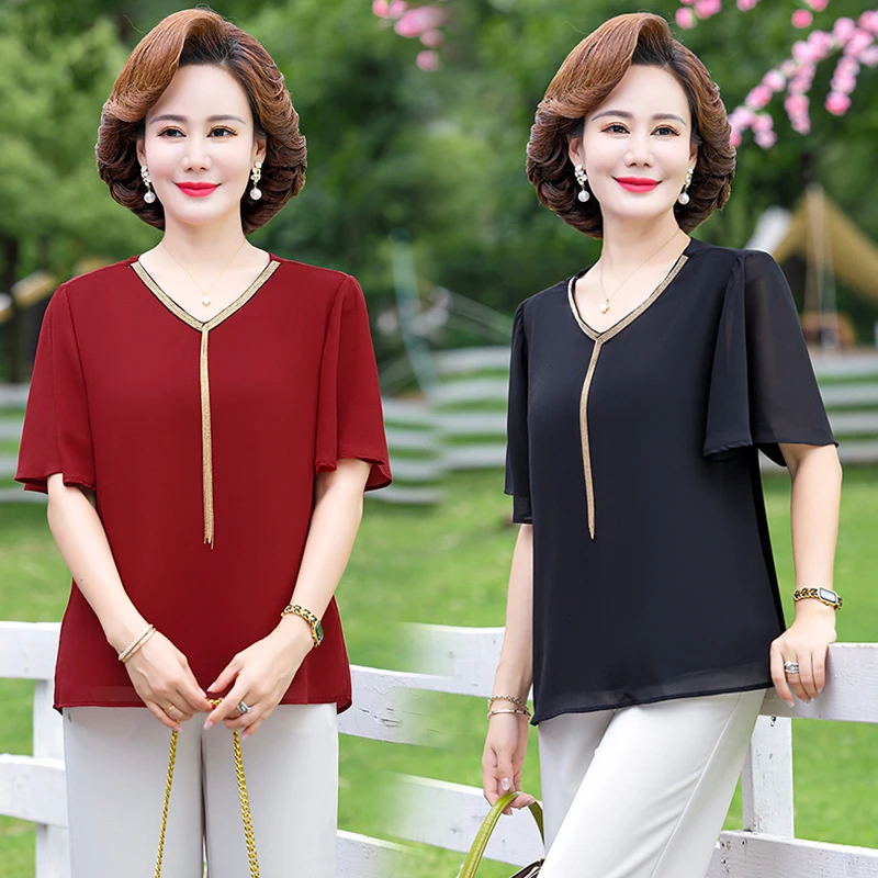 Summer Floral Printed Chiffon Shirt Short Sleeve Female Clothing Loose Stylish Commute V-neck tassel Blouse Mother Top
Summer Floral Printed Chiffon Shirt Short Sleeve Female Clothing Loose Stylish Commute V-neck tassel Blouse Mother Top