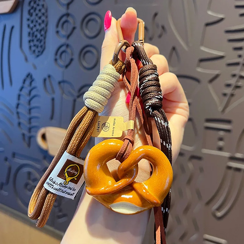 Fashion Multi Element Love Bag Pendant Nylon Rope Cute Creative Alkali Bread Ornament Key Holder Pendant Keychain Decor Gift
Fashion Multi Element Love Bag Pendant Nylon Rope Cute Creative Alkali Bread Ornament Key Holder Pendant Keychain Decor Gift