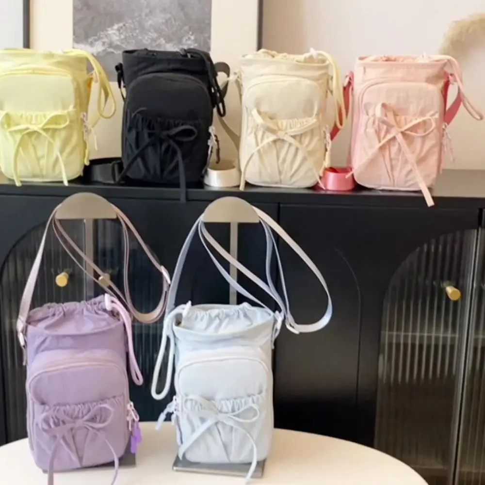 Bowknot Water Bottle Sling Bag Adjustable Multi-layer Gym Bottle Bag Waterproof Convenience Crossbody Sports Bottle Bag Travel
Bowknot Water Bottle Sling Bag Adjustable Multi-layer Gym Bottle Bag Waterproof Convenience Crossbody Sports Bottle Bag Travel