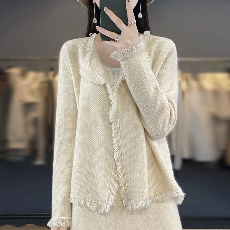 New 100% wool knitted coat in autumn and winter, one button cashmere cardigan, female tassel solid color blouse loose, slim and
New 100% wool knitted coat in autumn and winter, one button cashmere cardigan, female tassel solid color blouse loose, slim and
