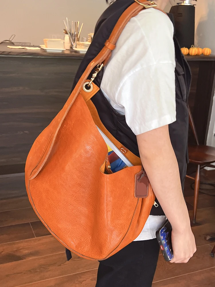 Легкая роскошная модная высококачественная женская сумка из воловьей кожи растительного дубления в стиле ретро, большая вместительная сумка через плечо из натуральной кожи 
Легкая роскошная модная высококачественная женская сумка из воловьей кожи растительного дубления в стиле ретро, большая вместительная сумка через плечо из натуральной кожи