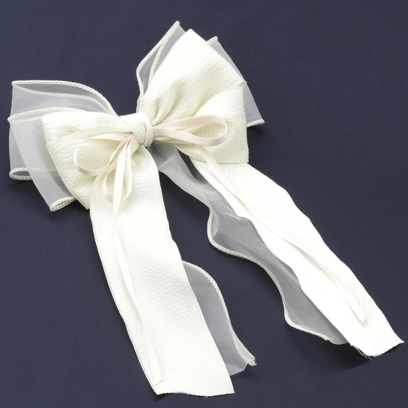 Hot selling ribbon bow girl streamer hairpin autumn versatile beige hair accessories daily styling temperament headwear
Hot selling ribbon bow girl streamer hairpin autumn versatile beige hair accessories daily styling temperament headwear