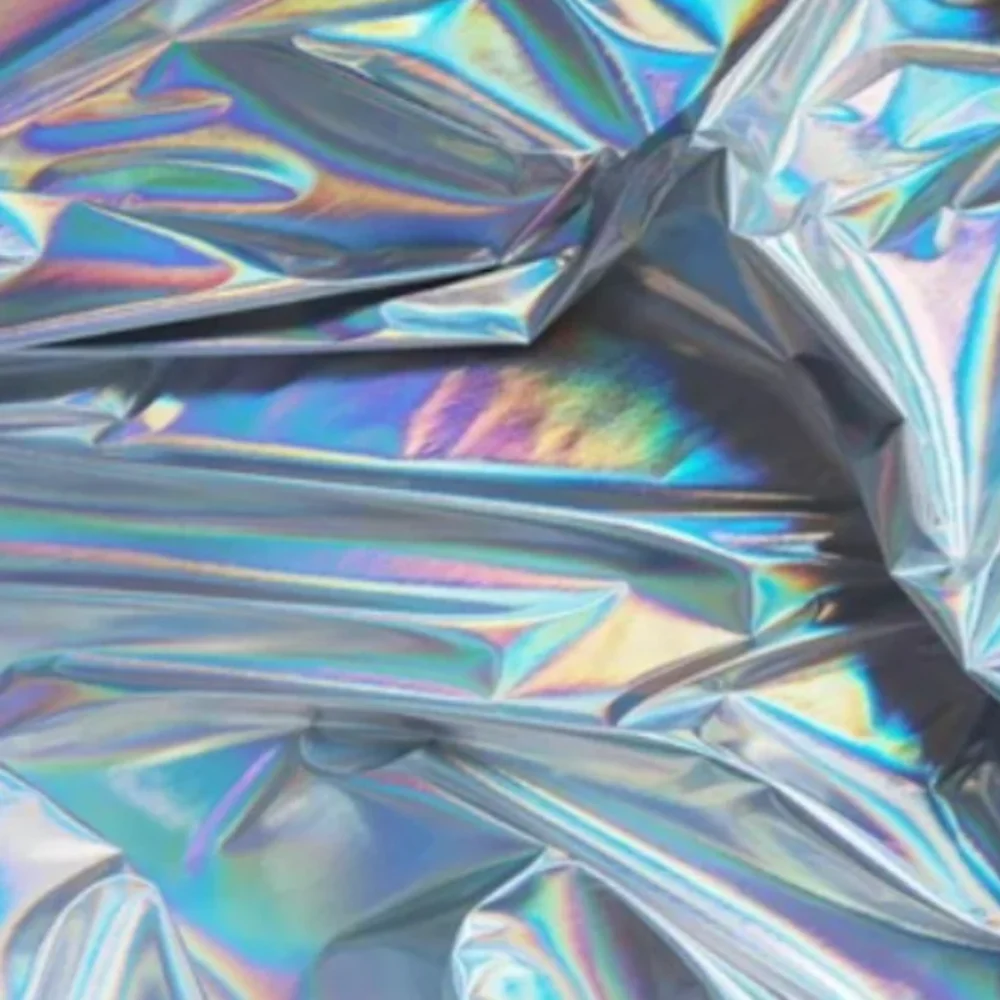 Illusionary Silver Waterproof Fabric for Diy Sew Soft Laser Background Fabrics Creative Coated Clothing Raincoat Designer Cloth
Illusionary Silver Waterproof Fabric for Diy Sew Soft Laser Background Fabrics Creative Coated Clothing Raincoat Designer Cloth