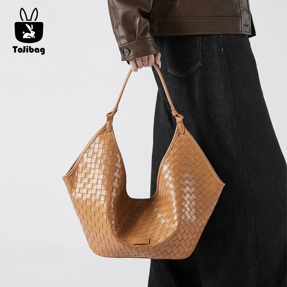2025 Genuine Leather Woven Large Capacity Tote Bag Shoulder Handbag Underarm Fashionable High-End Commuting Bags
2025 Genuine Leather Woven Large Capacity Tote Bag Shoulder Handbag Underarm Fashionable High-End Commuting Bags