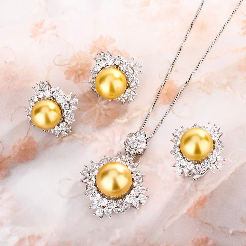 Australian White Tea Gold Pearl Zircon S925 Silver Needle Earrings Ring Necklace Set Light Luxury High-end Hair
Australian White Tea Gold Pearl Zircon S925 Silver Needle Earrings Ring Necklace Set Light Luxury High-end Hair