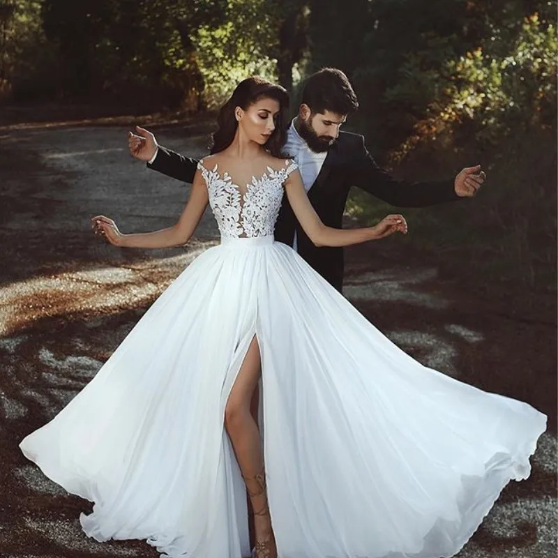 High Split Boho Chiffon Beach Wedding Dresses Sheer Back V Neck Lace Appliques Bride Gowns Evening Dress Vestidos De Novia
High Split Boho Chiffon Beach Wedding Dresses Sheer Back V Neck Lace Appliques Bride Gowns Evening Dress Vestidos De Novia