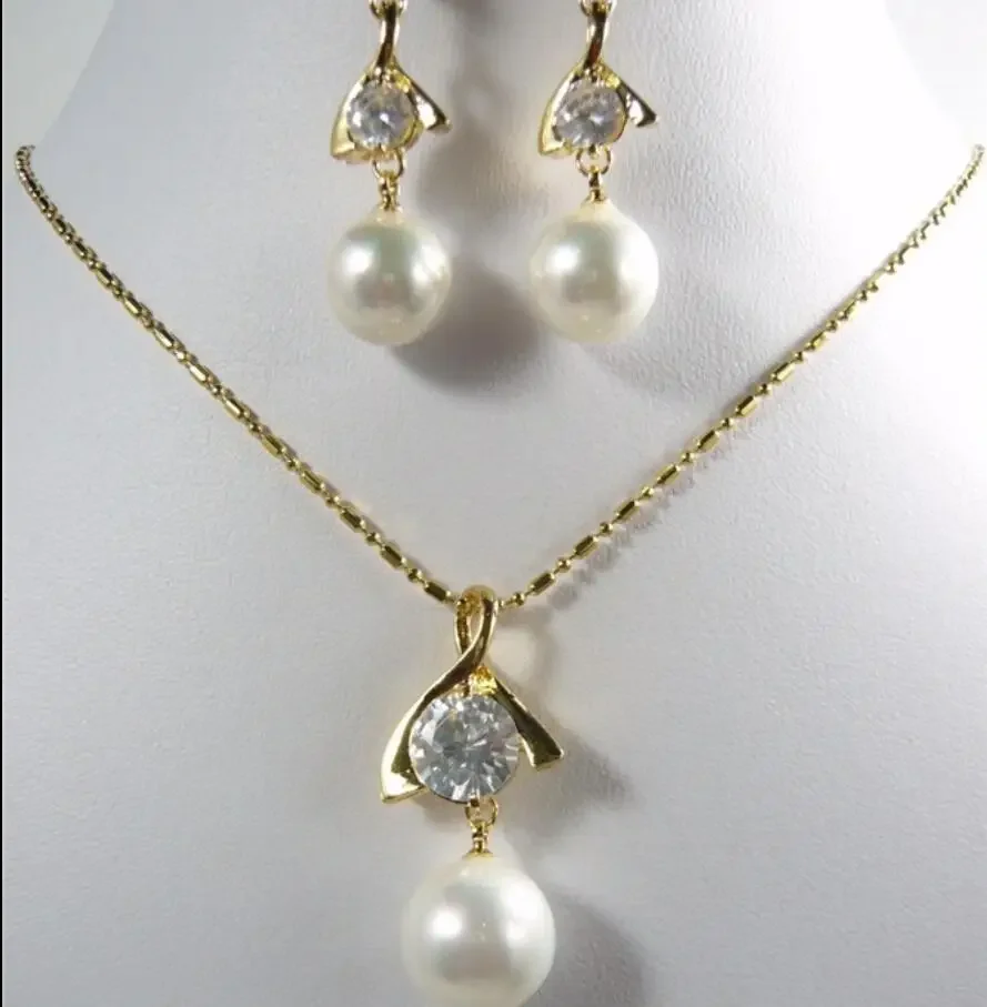 10-14mm white zircon white shell pearl Metal Gold Plated Jewelry Set Necklace Pendant Earrings women's Party Gift
10-14mm white zircon white shell pearl Metal Gold Plated Jewelry Set Necklace Pendant Earrings women's Party Gift