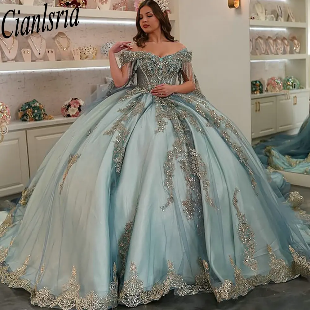 Голубое платье Quinceanera с открытыми плечами и кисточками, бальное платье с аппликациями, кружево Sweet 15 Años, мексиканское индивидуальное платье
Голубое платье Quinceanera с открытыми плечами и кисточками, бальное платье с аппликациями, кружево Sweet 15 Años, мексиканское индивидуальное платье