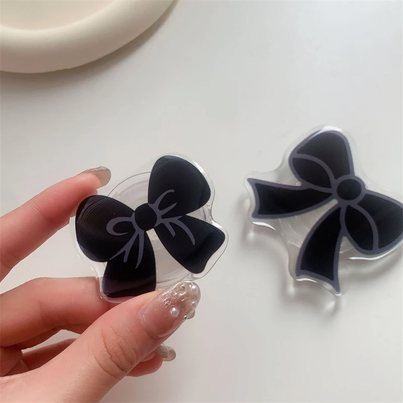 Милый мультяшный черный бант, ручка Tok Griptok, подставка для телефона, держатель для iPhone 16, Samsung S25, универсальный держатель для аксессуаров
Милый мультяшный черный бант, ручка Tok Griptok, подставка для телефона, держатель для iPhone 16, Samsung S25, универсальный держатель для аксессуаров