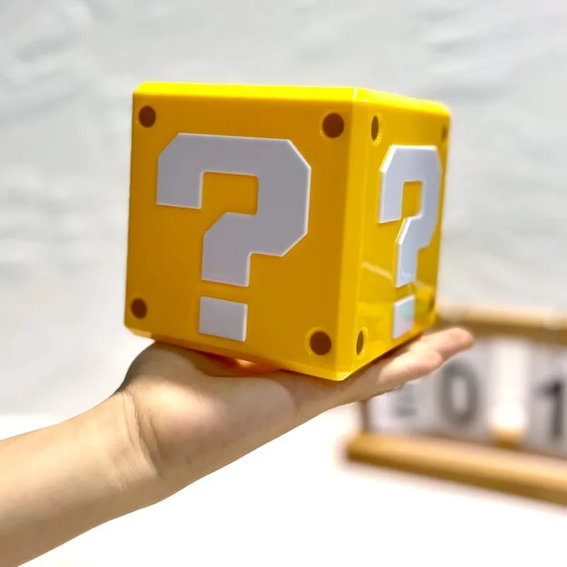 Cute Cartoon Voice Coin Piggy Bank Question Mark Square Piggy Bank Game Currency Storage Desktop Figurine Ornaments
Cute Cartoon Voice Coin Piggy Bank Question Mark Square Piggy Bank Game Currency Storage Desktop Figurine Ornaments